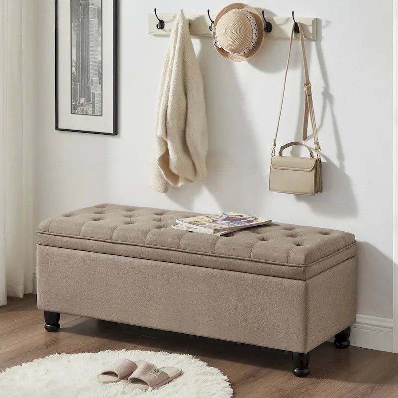 Banc de rangement capitonné avec pieds en bois tournés